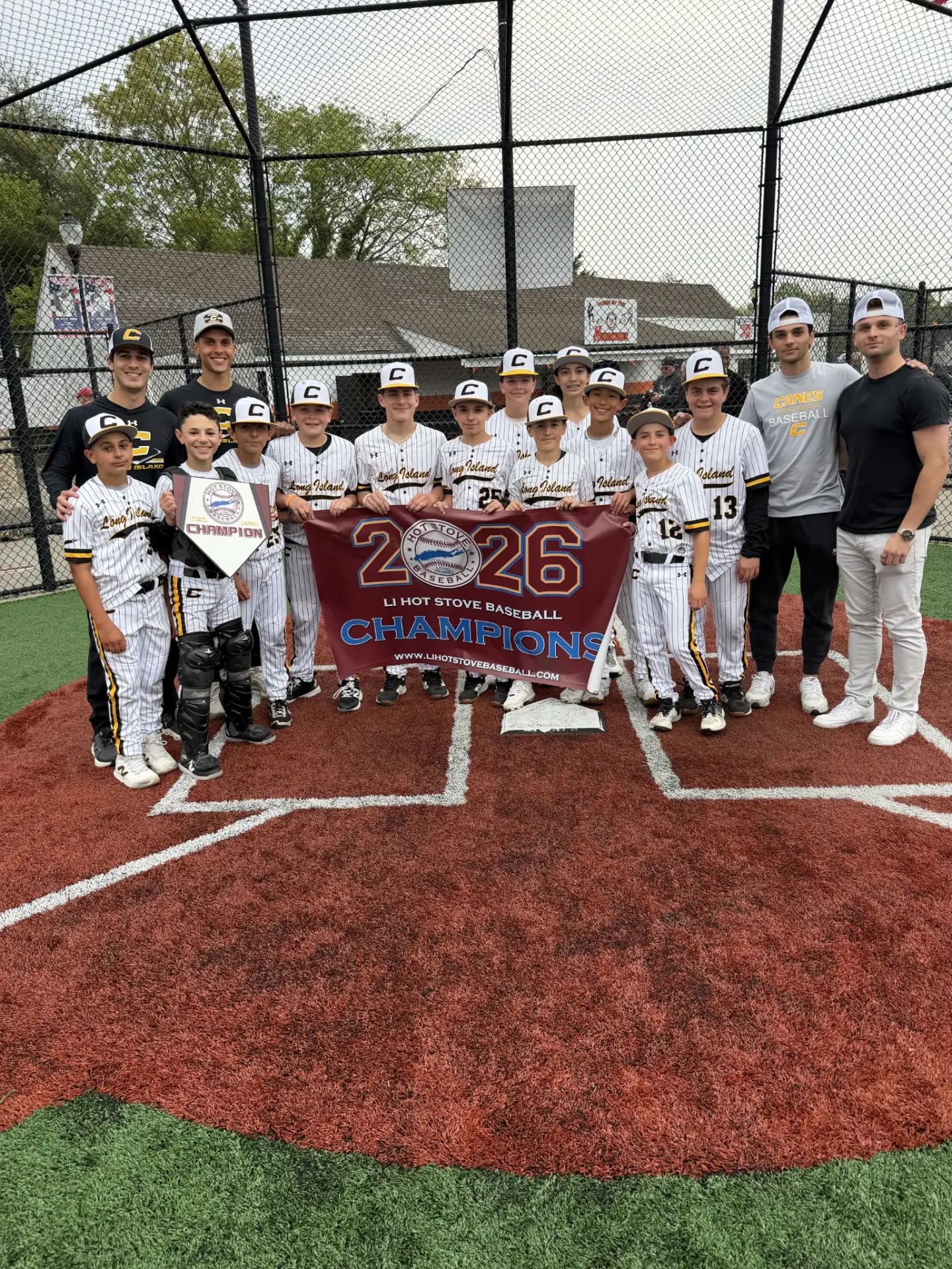 Canes Long Island team celebrating a 2026 LI Hot Stove Baseball championship